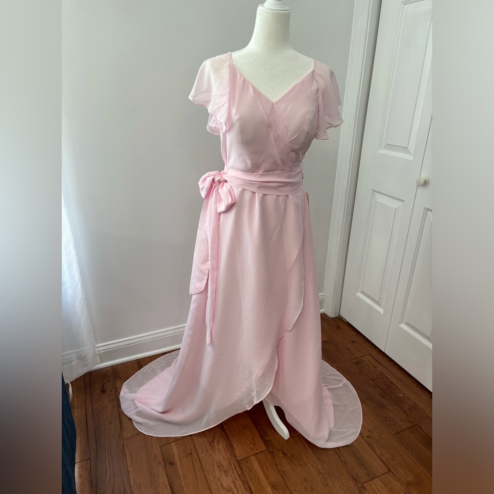 Mingda’s Gown, pale pink, flowy gown with longer back.